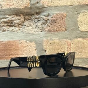Miu Miu Gold and Black Sunglasses Accessories